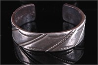 Navajo Heavy Stamped Coin Silver Bracelet