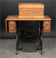 1909 New Home Sewing Machine & Oak Treadle Table
