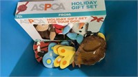 Tote with ASPCA dog toys, animal plates and