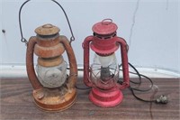 Two old barn lanterns one has been electrified