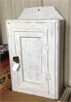 Medicine cabinet and old bottles in it