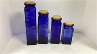 Set of 4 Cobalt blue glass cork bottles. Tallest
