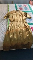 Unique Vintage gold 50's style ladies dress