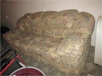 Upholstered sofa. Measures 95" long.