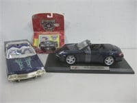 Three Collectible Cars See Info