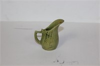 A Miniature Pottery Pitcher