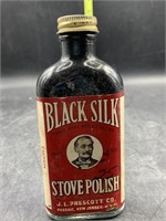 Black silk stove polish bottle
