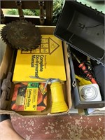 small oil can, saw blades, pipe wrench, chain saw