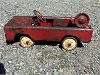 Vintage metal body pedal car