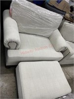 Upholstered oversized chair with matching ottoman
