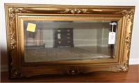 Antique gold framed decorative mirror with