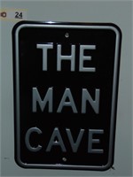 The Man Cave tin sign