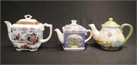 Three ceramic teapots