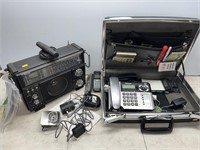 Briefcase, office supplies, short wave radio,