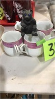 4 tea cups, bear