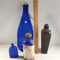 BLue bottles and coffin bottle