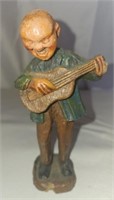 Hand carved wooden man with guitar figurine