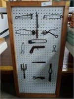 Primitive Tools Mounted on Peg Board