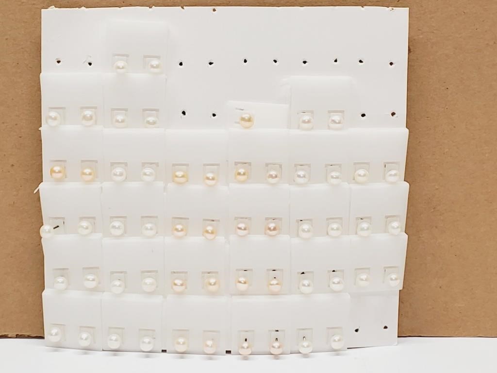 Over 25 Pair of Pearl Earrings