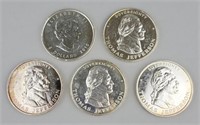 1 Canadian & 4 American One Oz Fine Silver Coins.