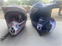 pair of youth helmets with goggles.