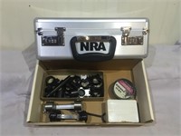 Tray lot – Assorted scope rings and an NRA hard