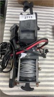 Warn 12V DC 2000LB. Rated load winch