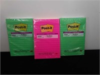 Three new packages of lined Post-it notes