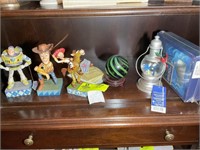 SHELF INCLUDING WALT DISNEY SHOWCASE COLLECTION, B