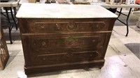 Victorian three drawer walnut chest with the