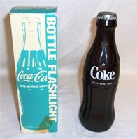 Coke flashlight.