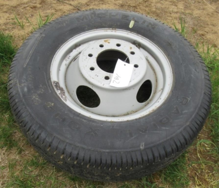 225/75R16 Tire on 8-lug rim.