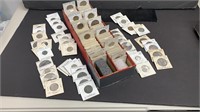 Large Assortment World / Foreign Coins in 2x2’s,