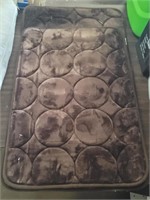 Two Brown Multi Use Floor Mats