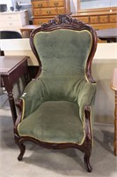 ANTIQUE UPHOLSTERED ARM CHAIR