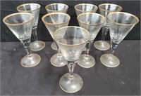 9 gold-rimmed wine glasses