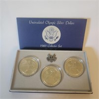 Two (2) Olympic Uncirculated Silver Dollar Sets