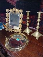 Two Decorative Mirrors and a Pair of Brass