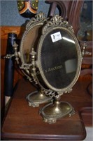 Pair of oval makeup mirrors with articulated