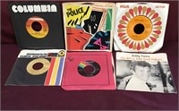 Box Of 45 Records With Classic Rock And Popular