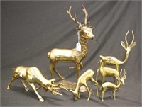 Group brass deer figures