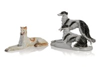 TWO CONTINENTAL PORCELAIN FIGURES OF BORZOIS DOGS