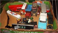 Various toy cars including dump truck, semis,
