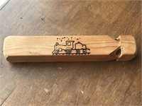 Old fashioned wooden train whistle