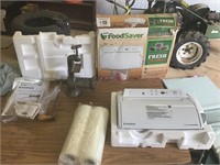 Food saver, bags, and hand meat grinder