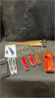 Assorted knives and leathermans