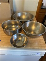 FOUR STAINLESS STEEL MIXING BOWLS