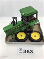 John Deere and Four Spare Wheels