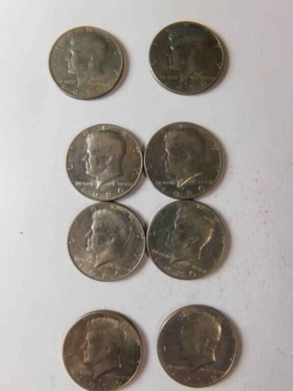 8 Kennedy half dollars…see description