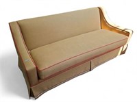 Tan Upholstered Sofa.